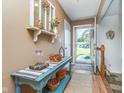 Welcoming foyer featuring a charming decor and a glimpse of the bright outdoors at 417 W Ash St, Jamestown, IN 46147