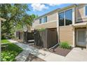Exterior view showcasing the well-maintained facade, fenced yard, and neatly landscaped surroundings at 5177 Fairway Dr, Avon, IN 46123