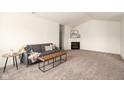 Bright living room featuring neutral walls, new carpet, and stylish modern furniture at 3006 Wildcat Ln, Indianapolis, IN 46203