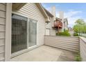 Cozy back patio area with sliding glass doors for indoor-outdoor living, great for relaxation and entertaining at 3050 Wildcat Ln, Indianapolis, IN 46203