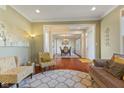 Spacious living area with open layout, flowing seamlessly into the dining room at 9749 Soaring Eagle Ln, Fishers, IN 46055