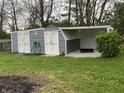 Spacious backyard shed with covered area, providing ample storage and workspace at 117 Fountain Lake Dr, Greenfield, IN 46140