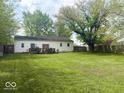 Spacious backyard with a large lawn, perfect for outdoor activities at 212 Vasbinder Dr, Chesterfield, IN 46017