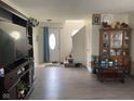 Bright living room featuring wood floors, neutral decor, and a welcoming atmosphere at 2350 Harvest Moon Dr, Greenwood, IN 46143