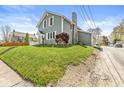 Charming home with well-kept lawn, brick chimney, and curb appeal at 315 W High St, Pendleton, IN 46064
