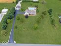 Expansive property with a pool, outbuildings, and long private drive at 6086 W 850 S, Edinburgh, IN 46124