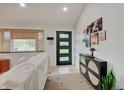 Inviting entryway with a modern front door, stylish console table, and neutral decor at 8049 Burn Ct, Indianapolis, IN 46217