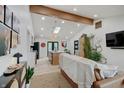 Bright, open-concept living room with vaulted ceilings, modern decor, and stylish furnishings at 8049 Burn Ct, Indianapolis, IN 46217