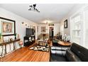 Spacious living room with hardwood floors and ample seating at 1014 W 32Nd St, Indianapolis, IN 46208