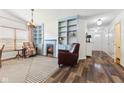 Cozy living room showcasing built-in shelving, fireplace, and comfortable seating at 1105 Wild Ridge Blvd, Brownsburg, IN 46112