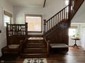 Detailed staircase with dark wood, lots of light and charming design at 2161 N Pennsylvania N St, Indianapolis, IN 46202