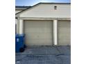 Two-car garage doors with attached unit number, providing secure parking and storage space at 4984 W 59Th St, Indianapolis, IN 46254