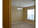 Room featuring neutral walls, carpet, and window at 5708 Outer Bank Rd, Indianapolis, IN 46239