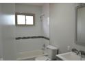 Updated bathroom with white subway tile, modern fixtures, and a sleek vanity at 5979 S Walcott St, Indianapolis, IN 46227