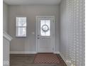 Welcoming foyer with modern accents at 192 Bluestem Ln, Whiteland, IN 46184