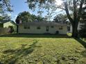 Spacious back yard with mature trees at 2453 Larnie Ln, Indianapolis, IN 46219