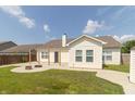 Spacious backyard with a concrete patio, perfect for outdoor entertaining and relaxation at 2761 Winding Creek Ln, Greenfield, IN 46140