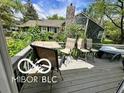View of the patio with seating, with the exterior of the house visible in the background at 4655 Framington Ct, Indianapolis, IN 46254