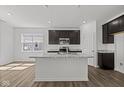 Kitchen with granite island and stainless steel appliances at 1874 Victor Higgins Dr, Shelbyville, IN 46176