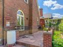 Charming exterior brickwork and an inviting porch, perfect for relaxing evenings at 333 N Kenyon St, Indianapolis, IN 46219