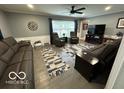Comfortable living room with plush seating, stylish decor, and ample natural light at 3829 Waycross Dr, Columbus, IN 47203