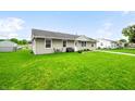 Charming home with a green lawn, perfect for outdoor activities and curb appeal at 605 Memorial Dr, Edinburgh, IN 46124