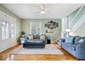 Inviting living room with hardwood floors, modern decor, and plenty of natural light at 925 S State Ave, Indianapolis, IN 46203