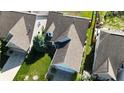 Bird's eye view of residential neighborhood showing roof lines, lawn, and mature landscaping at 12551 Hawks Landing Dr, Fishers, IN 46037