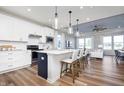 Bright kitchen with a large island, stainless appliances, and open floor plan at 13324 Roundtop Rd, Noblesville, IN 46060