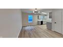 Modern kitchen with sleek white cabinets, stainless steel appliances, and stylish fixtures, blending style with functionality at 1918 Cornell Ave, Indianapolis, IN 46202