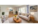 Cozy living room with hardwood floors, comfortable seating, and a view to the entryway at 331 W 5Th St, Lapel, IN 46051
