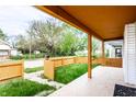 Covered front porch provides shade and protection from the elements at 647 Coffey St, Indianapolis, IN 46221