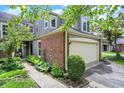 Charming two-story home featuring a two-car garage and beautifully landscaped front yard at 6505 Miramar Ct, Indianapolis, IN 46250