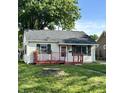 Charming single-story home featuring a red porch, well-maintained lawn, and inviting curb appeal at 728 Lonsvale Dr, Anderson, IN 46013