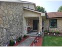 Inviting front porch featuring a bench, plants, and decorative accents at 8111 Timberwood Dr, Plainfield, IN 46168
