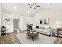 Bright living room features vaulted ceilings, fireplace, and modern decor at 815 Stewart Rd, Anderson, IN 46012