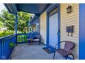Cozy front porch with outdoor seating and a welcoming entrance to a well-maintained home at 2260 Central Ave, Indianapolis, IN 46205