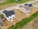 Aerial view of a neighborhood featuring newly constructed homes and spacious lots at 576 Plowman Dr, Shelbyville, IN 46176