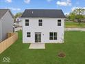 This home includes a spacious backyard with ample green space at 576 Plowman Dr, Shelbyville, IN 46176