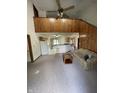 Spacious living room with vaulted ceilings, a ceiling fan, and an open floor plan at 636 Mallards Xing # 2-A, Martinsville, IN 46151