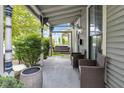 Inviting porch with outdoor seating, perfect for enjoying the neighborhood views at 767 Fletcher Ave, Indianapolis, IN 46203