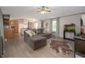 A cozy living room with light-colored walls and wood-look flooring at 9621 N County Road 25 W, Muncie, IN 47303