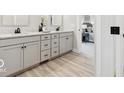 Elegant bathroom boasts dual sinks, granite countertops, and modern fixtures at 1303 N 8Th St, Elwood, IN 46036