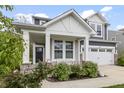 Charming porch with stone accents, white columns, and a cozy bench, perfect for relaxing outdoors at 4629 Rainwater Ln, Whitestown, IN 46075