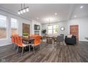 Open-concept space with dining and living areas featuring modern decor and ample natural light at 1009 Harrison St, Indianapolis, IN 46202