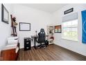 Office space with laminate floors, ample natural light, and room for a desk, shelving, and other office accessories at 17951 Paula Walk, Westfield, IN 46074