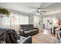 Cozy living room with plush seating, soft lighting, and elegant decor at 349 Clark Ave, Beech Grove, IN 46107