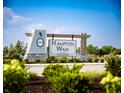 Hampton Walk entrance sign with attractive landscaping at 6203 Hampton Walk Blvd, McCordsville, IN 46055