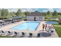 Community pool featuring lounge chairs and a place to gather with friends at 6203 Hampton Walk Blvd, McCordsville, IN 46055