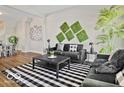 Stylish living room featuring contemporary decor, modern furniture, and ample natural light at 921 S State Ave, Indianapolis, IN 46203